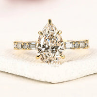 Pear Cut Moissanite Diamond Engagement Ring with Baguette Accent Band