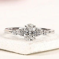 Oval Cut Lab Grown Diamond With Marquise Side Stones