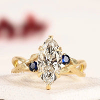 Marquise Cut Lab Grown Diamond And Blue Sapphire Engagement Ring