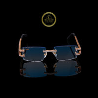 Iced Out Custom Diamond Sunglasses with Blue Rimless Lenses