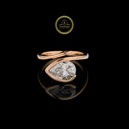 Pear Cut Moissanite Diamond Bypass Solitaire Ring
