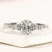 Oval Cut Moissanite Diamond With Marquise Side Stones