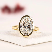 Bezel Set Hidden Halo Oval Lab Grown Diamond Engagement Ring