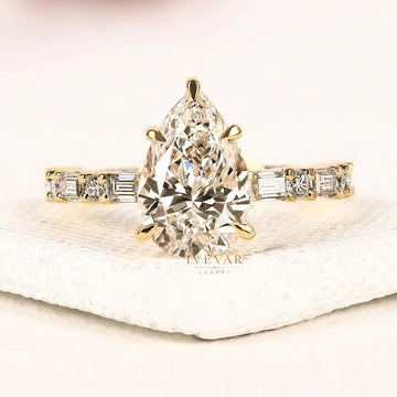 Pear Cut Lab Grown Diamond Engagement Ring with Baguette Accent Band