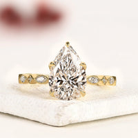 Pear Cut Moissanite Diamond Ring with Marquise Side Stones