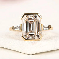 Emerald Cut Lab Grown Half Bezel Set Three Stone Engagement Ring