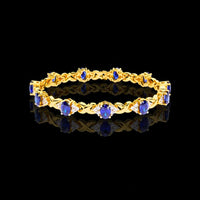 Oval Blue Sapphire Infinity Link Bracelet with Moissanite Diamonds