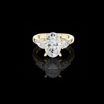 3.00 CT Refined Oval Cut Three Stone Lab Diamond Ring in Gold with Round Side Stones For Boho Chic