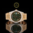 Luxury watch with green face and gold casing 
