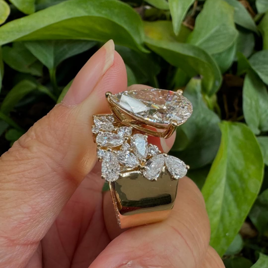 3.00 CT Iconic Pear Cut Moissanite Diamond with Asymmetrical Floral Cluster and Open Shank Luxury Bridal Ring