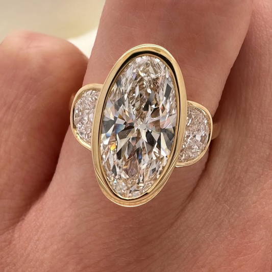 Oval Lab Grown Bezel Set Ring With Half Moon Side Stone