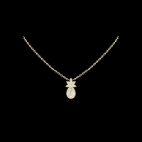 Lotus Motif Statement Charm Featuring Pear Cut Moissanite Solitaire