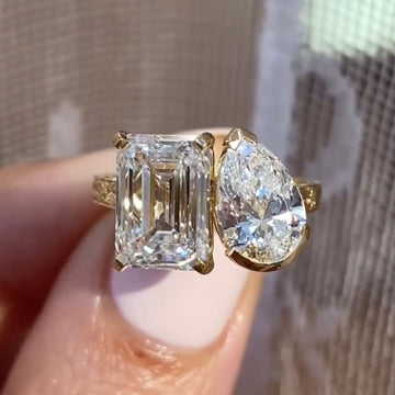 2.5 CT Toi et Moi Lab Diamond Ring with Emerald Cut & Pear Shape Stones in Textured Gold Setting