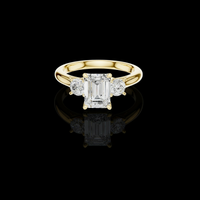 Classic Emerald With Round Side Moissanite Diamond Ring