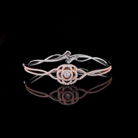 Round Cut Moissanite Diamond Twisted Crossover Bangle