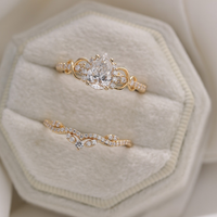 2.00 CT Teardrop Pear Shaped Ring Set with Halo Accents & Twisted Moissanite Diamond Wedding Band