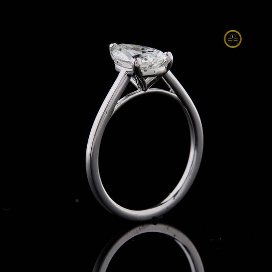 Pear Cut Solitaire Moissanite Diamond Engagement Ring With Cathedral Basket