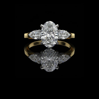 Oval Cut Moissanite Engagement Three Stone Ring With Side Pear Stone