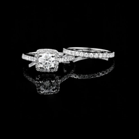 Round Cut Moissanite Diamond Pavé Bridal Set with Split Shank Engagement Ring
