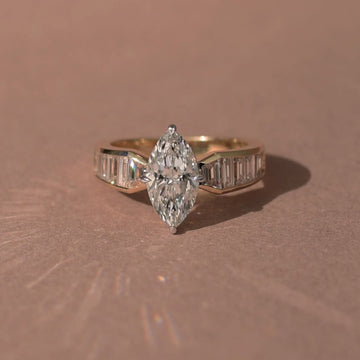 2.32 CT Starlane Marquise Moissanite Diamond Ring with Channel Set Baguette Accents in Refined Gold
