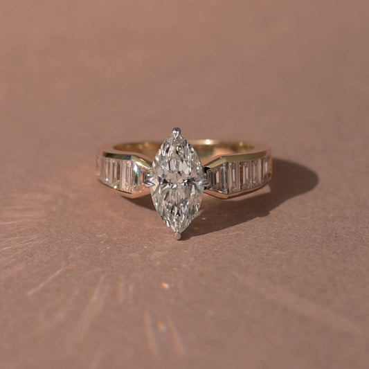 2.32 CT Starlane Marquise Moissanite Diamond Ring with Channel Set Baguette Accents in Refined Gold