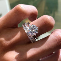 Round Moissanite Diamond Solitaire Ring with Baguette Diamond Band