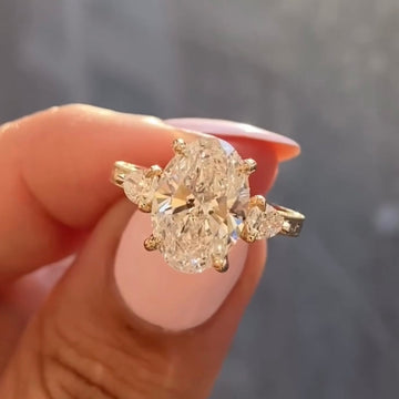 Oval Diamond Lab Grown Three Stone Ring with Pear Side Diamonds