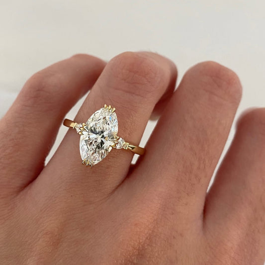 3.00 CT Graceful Oval Cut Moissanite Diamond Ring with Delicate Pear Side Accent Stones