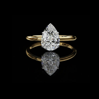 0.89 TCW A Pear Cut Lab Grown Diamond Set on a Sleek Band for Unmatched Elegance