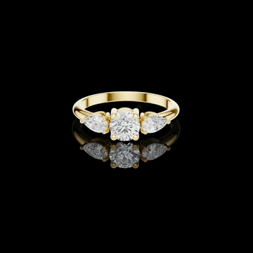 0.50 CT Petal Grace Round Brilliant Lab Grown Diamond Ring with Pear Cut Side Accents