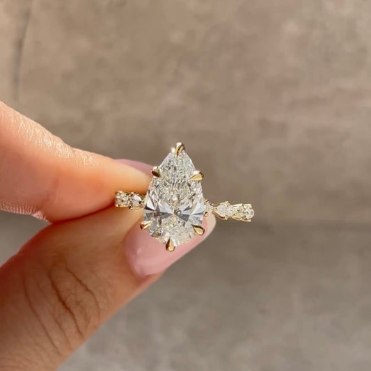 Pear Cut Solitaire Lab Diamond Engagement Ring With Twisted Pave Band