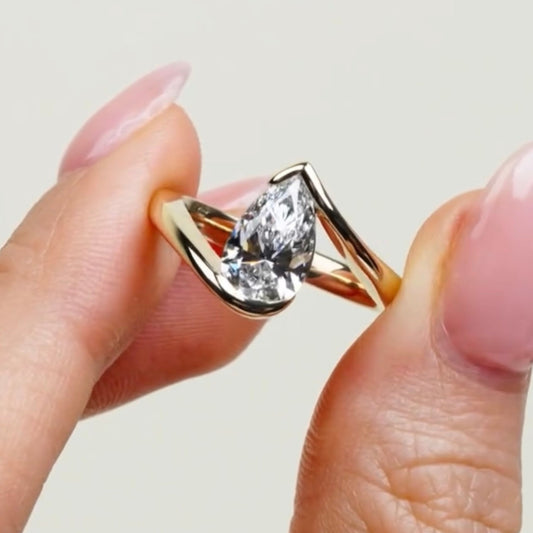 Antique Style Pear Cut Moissanite Diamond Bypass Solitaire Ring