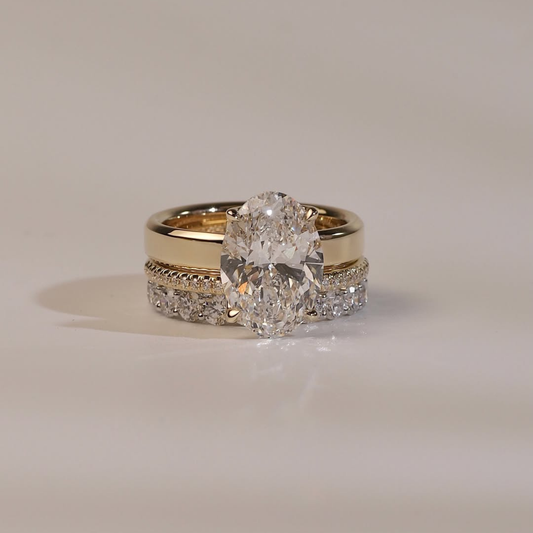 Oval Cut Bridal Ring Set With Lab Grown Pave Bands