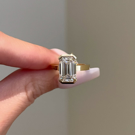 Emerald Lab Grown Half Bezel Solitaire Ring With Wide Gold Band