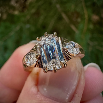Emerald Cut Moissanite Diamond Ring with Pear Side Stones