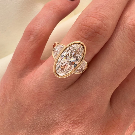 Oval Lab Grown Bezel Set Ring With Half Moon Side Stone