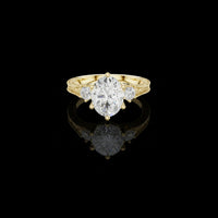 Vintage Engraved Oval Cut Moissanite Ring with Round Side Stones